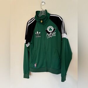 Adidas lightweight zip up jacket with Celtic's logo.